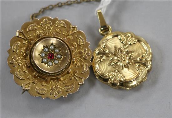 A Victorian 9ct gold and gem set brooch and a gold plated pendant.